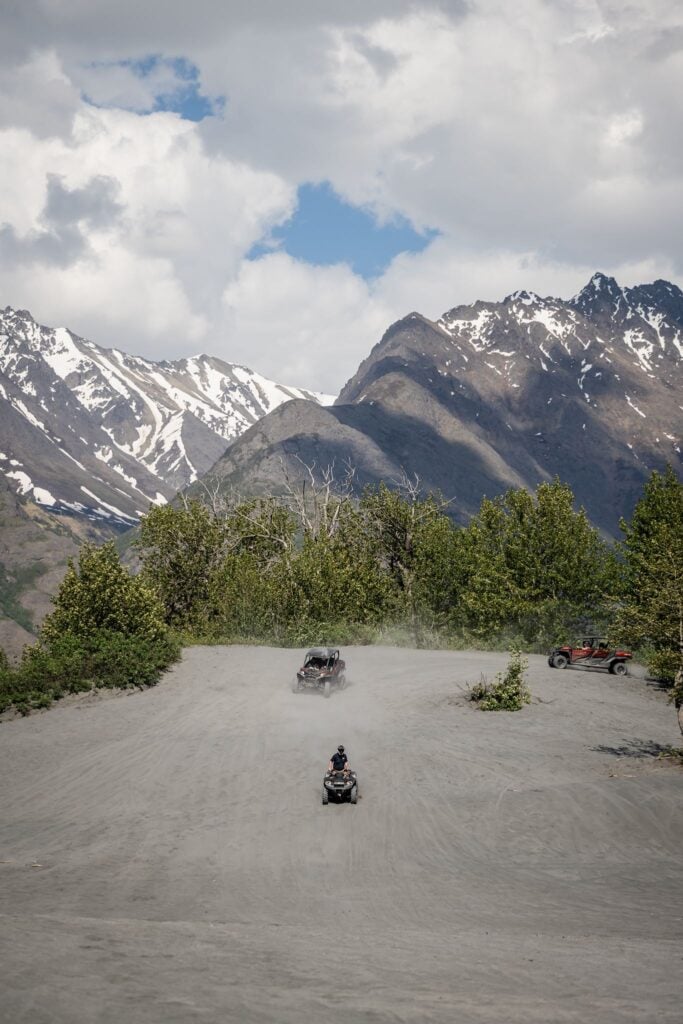 utvs hill climbing with mountain view sin the distance